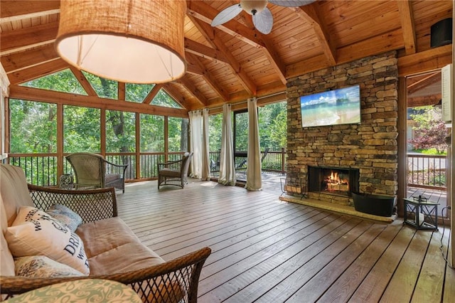 7875 Robin Rd, Cumming, GA 30041 - sunroom / solarium featuring a stone fireplace and a ceiling fan