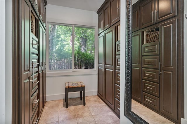 7875 Robin Rd, Cumming, GA 30041 - interior space with baseboards and light tile patterned floors