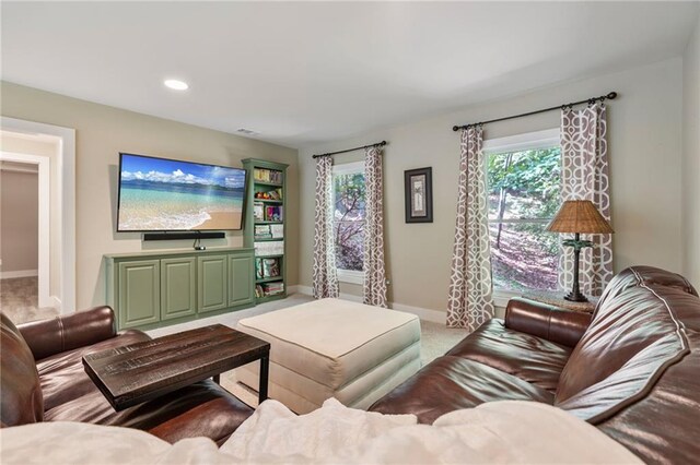 7875 Robin Rd, Cumming, GA 30041 - carpeted living room featuring baseboards and recessed lighting