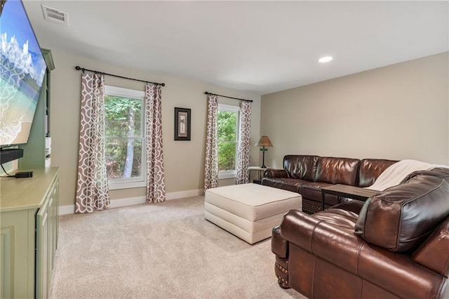 7875 Robin Rd, Cumming, GA 30041 - living area featuring light carpet, baseboards, and recessed lighting
