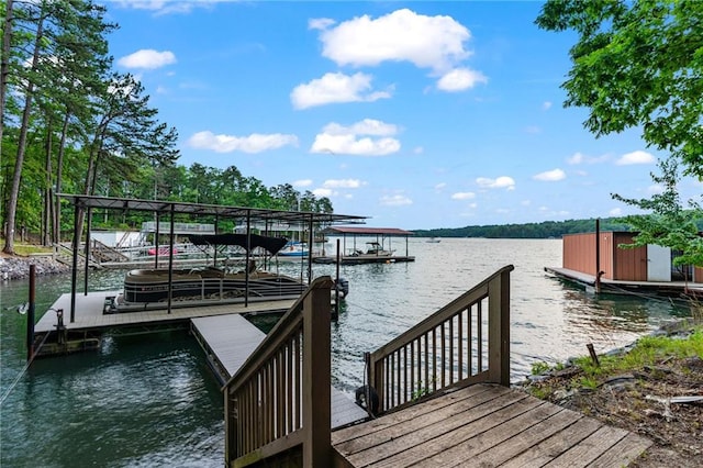 7875 Robin Rd, Cumming, GA 30041 - dock featuring a water view and boat lift