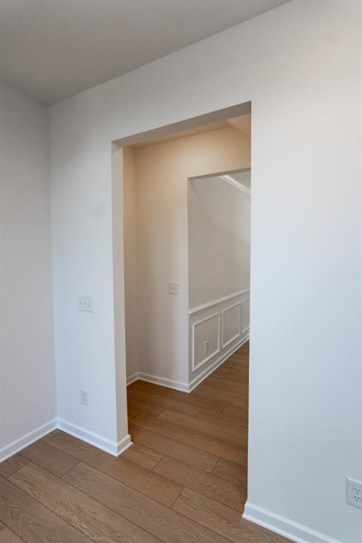296 River Run Dr, Dallas, GA 30132 - spare room featuring hardwood / wood-style flooring and baseboards