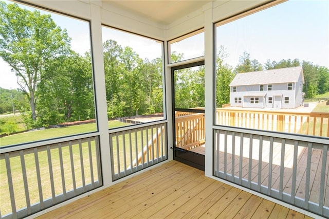 296 River Run Dr, Dallas, GA 30132 - unfurnished sunroom featuring view of scattered trees