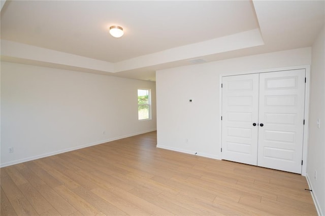 296 River Run Dr, Dallas, GA 30132 - unfurnished bedroom with light wood finished floors, baseboards, and a closet
