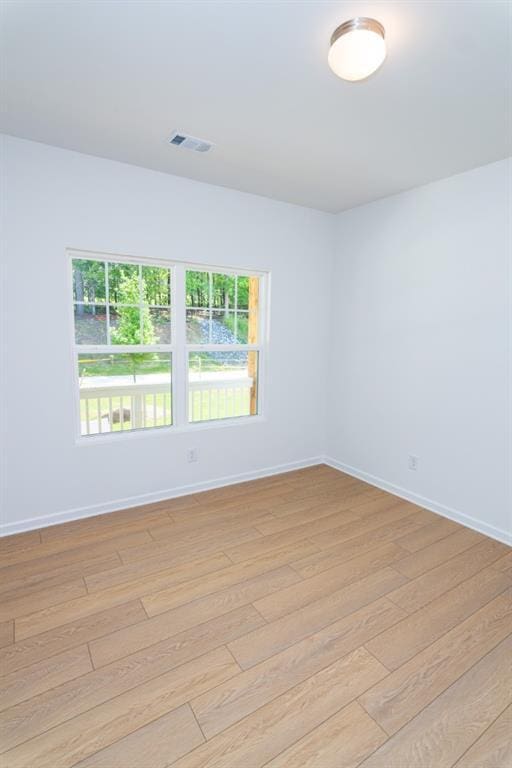 296 River Run Dr, Dallas, GA 30132 - spare room featuring light wood-style floors and baseboards