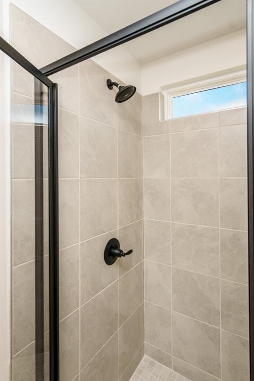 296 River Run Dr, Dallas, GA 30132 - bathroom featuring a stall shower