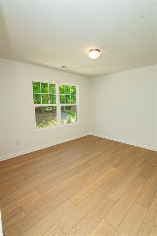 296 River Run Dr, Dallas, GA 30132 - unfurnished room with light wood-style floors and baseboards