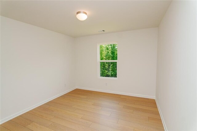 296 River Run Dr, Dallas, GA 30132 - unfurnished room featuring light wood-type flooring and baseboards