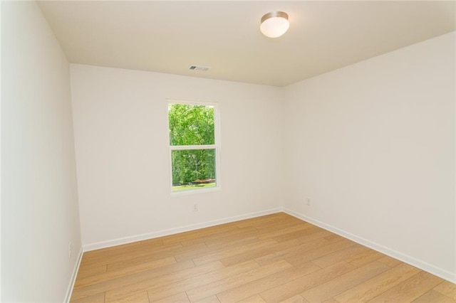 296 River Run Dr, Dallas, GA 30132 - empty room featuring light wood-type flooring and baseboards