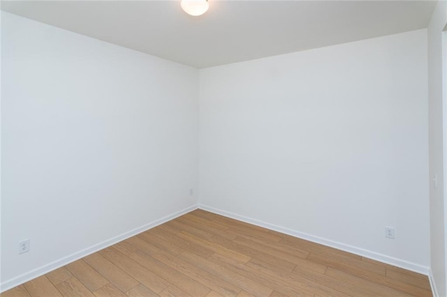 296 River Run Dr, Dallas, GA 30132 - spare room with light wood-style flooring and baseboards