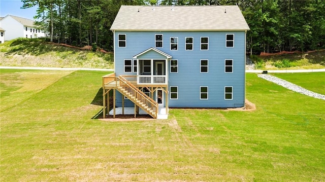 296 River Run Dr, Dallas, GA 30132 - back of house with a yard, a sunroom, and stairs