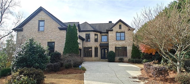 view of front of house featuring brick siding