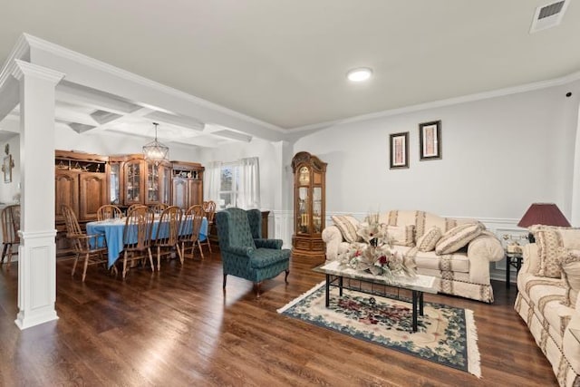 living room with coffered ceiling, ornamental molding, dark hardwood / wood-style floors, and decorative columns