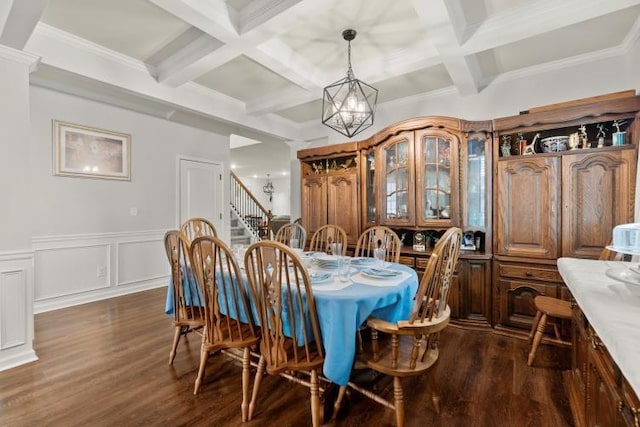 dining room featuring coffered ceiling, a notable chandelier, beam ceiling, and dark wood-type flooring