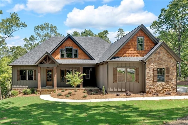 33 Cedar Gate Ln, Kingston, GA 30145 - craftsman-style home with board and batten siding, a front lawn, and roof with shingles