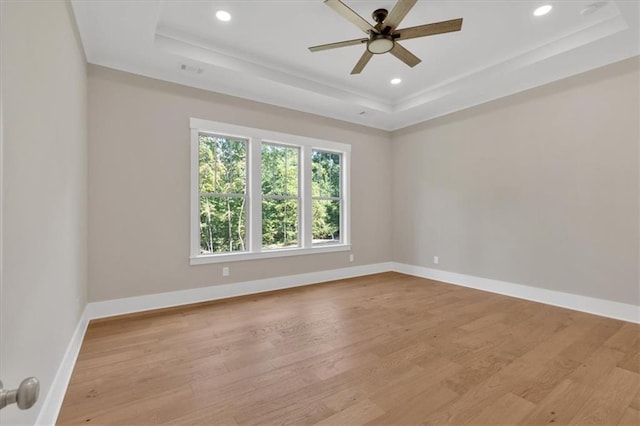 33 Cedar Gate Ln, Kingston, GA 30145 - spare room with a raised ceiling, wood finished floors, ceiling fan, baseboards, and recessed lighting