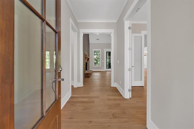 33 Cedar Gate Ln, Kingston, GA 30145 - hallway featuring french doors, light wood-type flooring, baseboards, and crown molding
