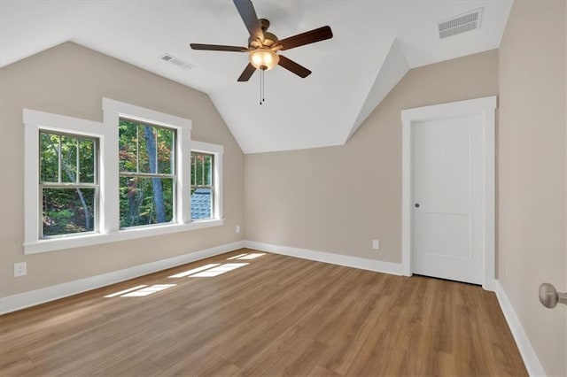 33 Cedar Gate Ln, Kingston, GA 30145 - bonus room featuring vaulted ceiling, a ceiling fan, light wood-style floors, and baseboards
