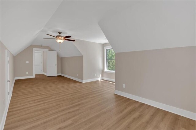 33 Cedar Gate Ln, Kingston, GA 30145 - bonus room featuring light wood-type flooring, lofted ceiling, ceiling fan, and baseboards