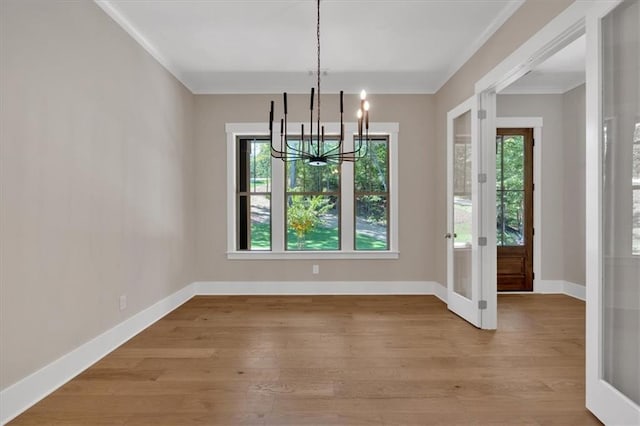 33 Cedar Gate Ln, Kingston, GA 30145 - unfurnished dining area with a chandelier, light wood-style flooring, baseboards, and french doors