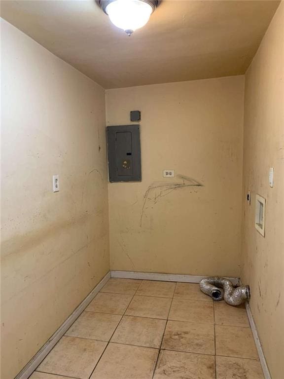 washroom featuring light tile patterned floors and electric panel