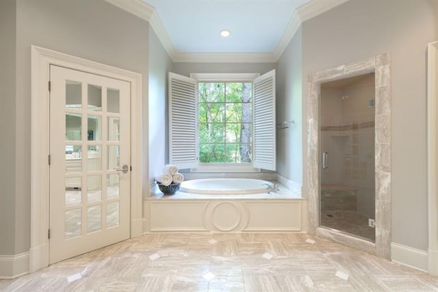 bathroom with independent shower and bath and ornamental molding