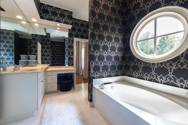 bathroom with vanity, tile patterned floors, and a bathing tub