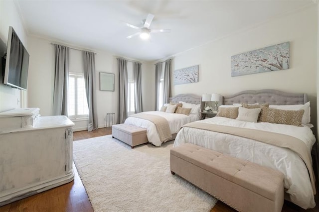 bedroom featuring ceiling fan and hardwood / wood-style floors