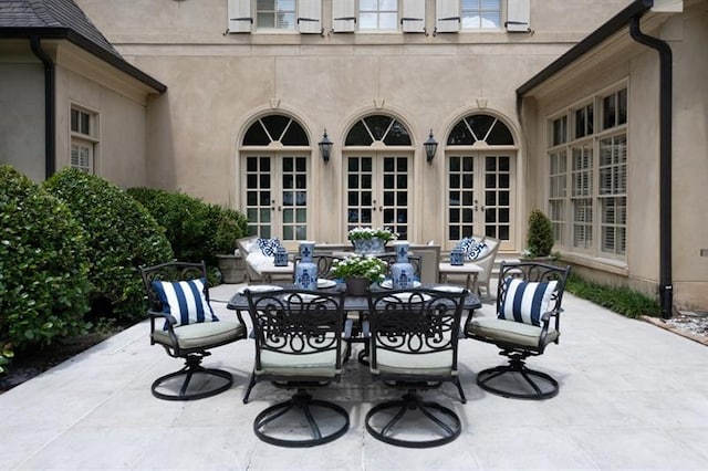 view of patio featuring french doors