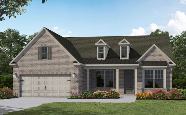 view of front of property with a garage and a front lawn