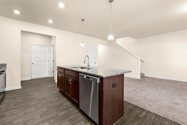 kitchen featuring dark brown cabinets, a kitchen island with sink, sink, decorative light fixtures, and dishwasher