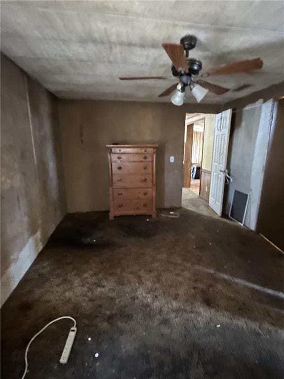 interior space featuring ceiling fan