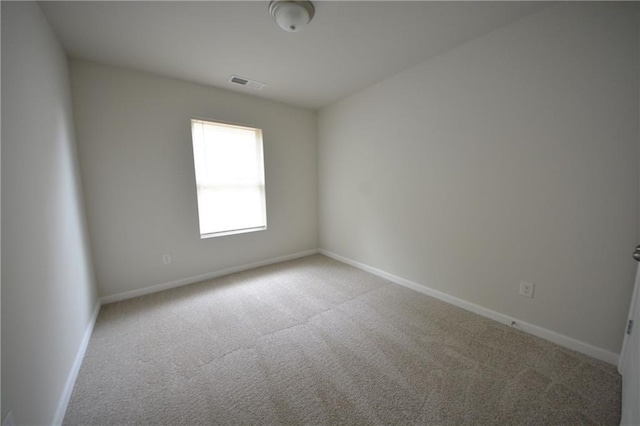 empty room featuring carpet floors