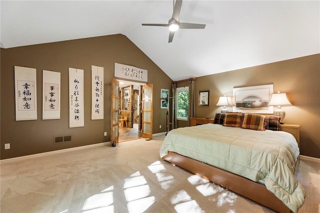 bedroom featuring ceiling fan, light colored carpet, and high vaulted ceiling