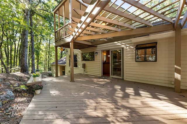 wooden terrace with a pergola