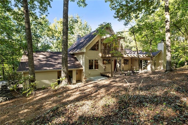 rear view of property with a patio area