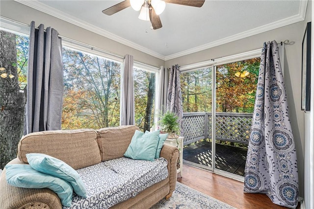 sunroom with ceiling fan