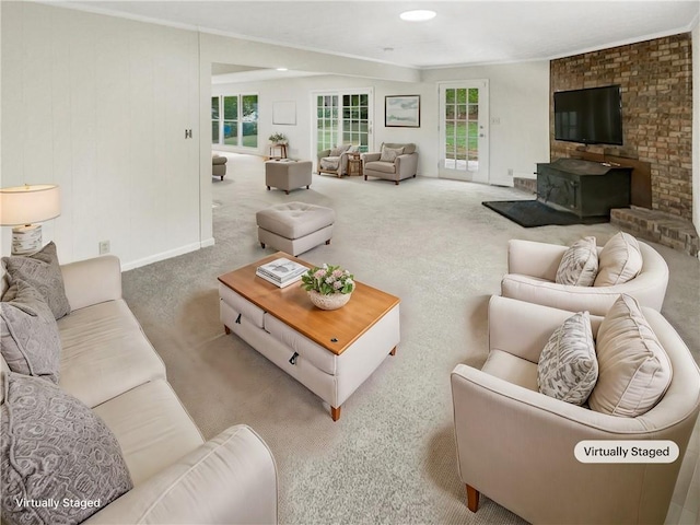 living room with carpet flooring and a wealth of natural light