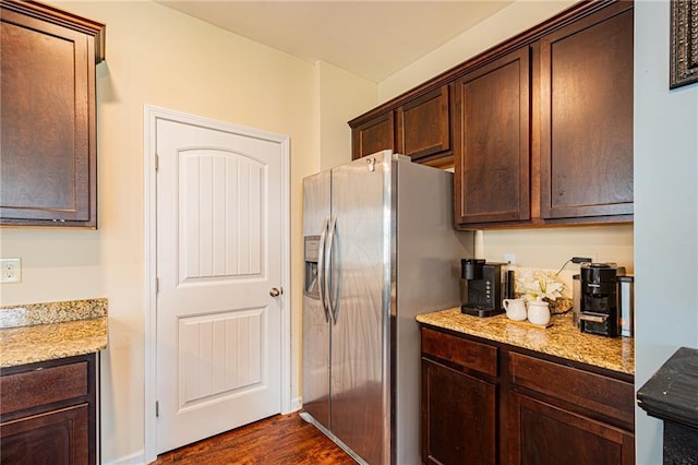 305 Thimbleberry Dr, Dawsonville, GA 30534 - kitchen with stainless steel fridge with ice dispenser, dark brown cabinetry, dark wood-style flooring, and light stone counters