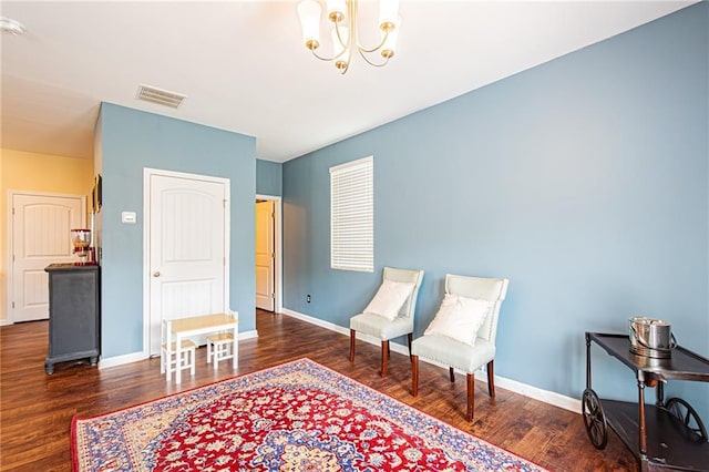 305 Thimbleberry Dr, Dawsonville, GA 30534 - sitting room with wood finished floors and a chandelier