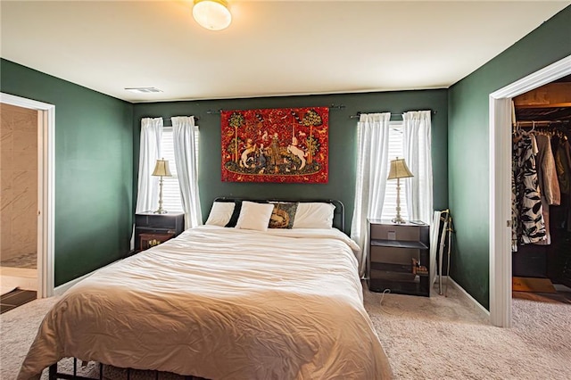 305 Thimbleberry Dr, Dawsonville, GA 30534 - bedroom with carpet floors, multiple windows, a closet, and a spacious closet