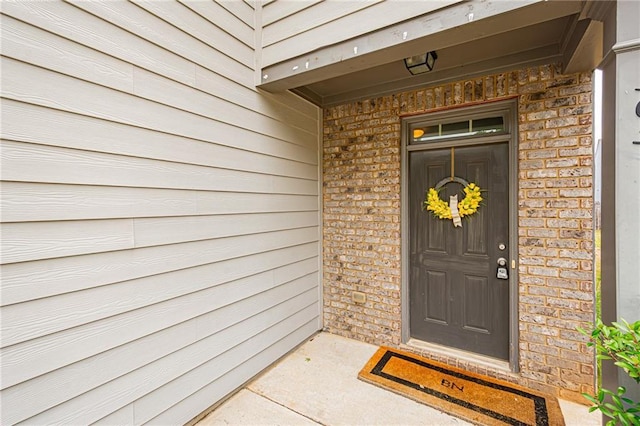 305 Thimbleberry Dr, Dawsonville, GA 30534 - doorway to property featuring brick siding