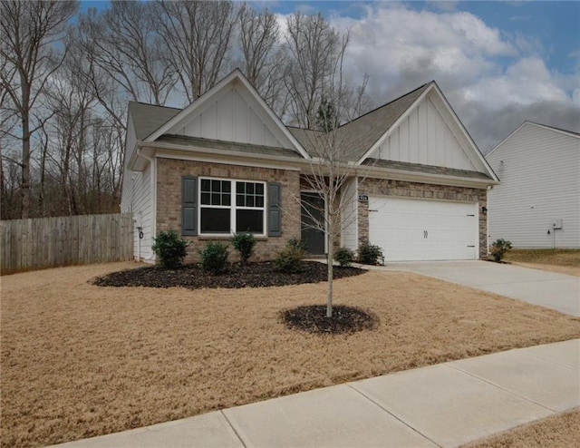 view of front facade with driveway, a garage, board and batten siding, and brick siding