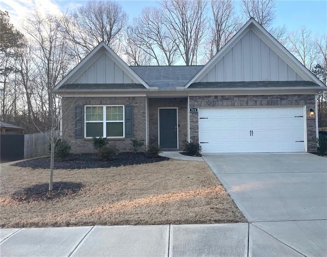 view of front of property featuring board and batten siding, concrete driveway, brick siding, and a garage