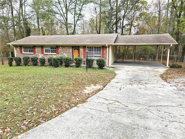 single story home with a front yard and a carport