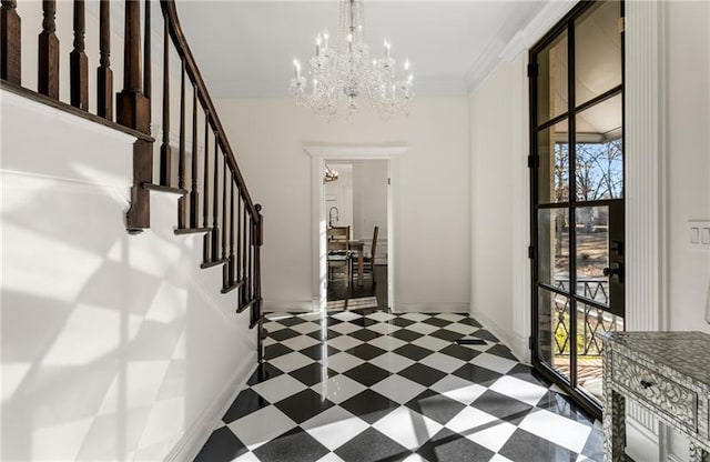 foyer featuring tile patterned floors, a healthy amount of sunlight, a chandelier, and ornamental molding