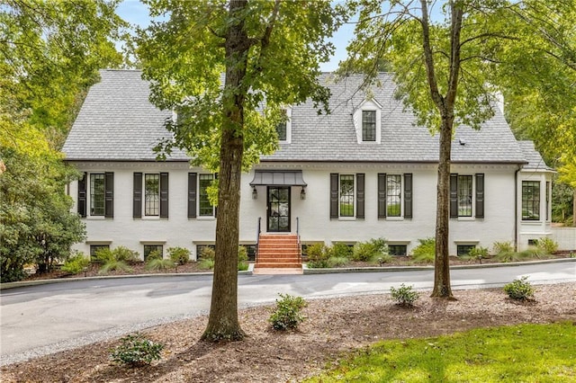 view of new england style home