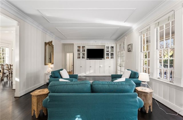 living room with crown molding and dark hardwood / wood-style floors