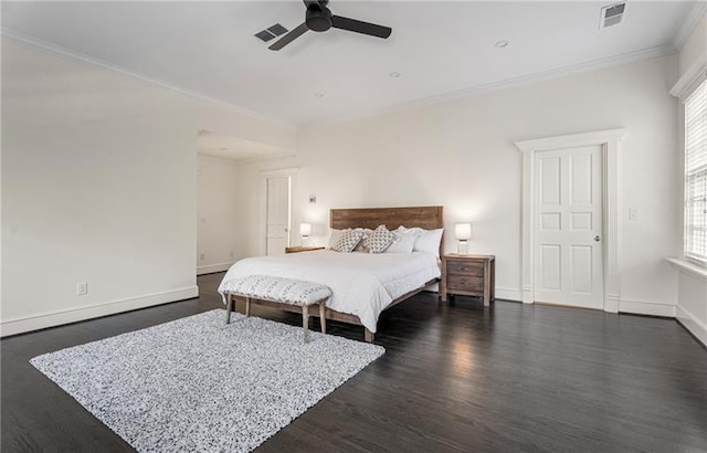 bedroom with ceiling fan, dark wood-type flooring, and crown molding