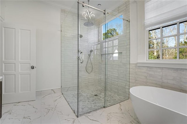 bathroom with tile patterned flooring, tile walls, and plus walk in shower